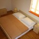 s�sz�ll�s: Rombon apartmanh�z